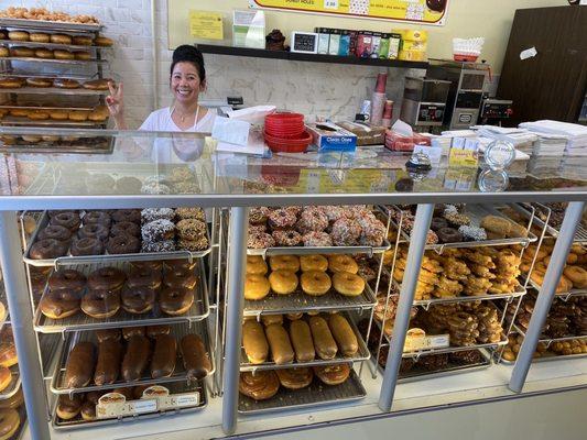 This is half of the fresh doughnuts. Happy helper too!  maple bars and more!