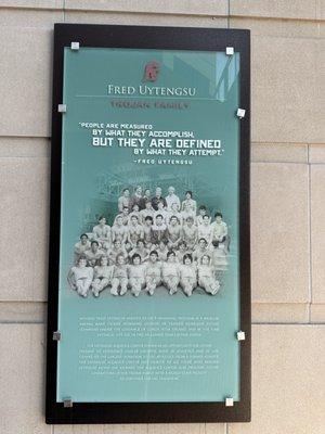 Fred Uytengsu, Team Captain, surrounded by his teammates - near the entry to the complex