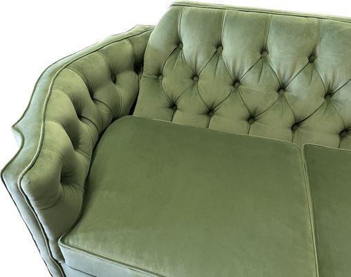 Close up of a beautifully tufted sofa