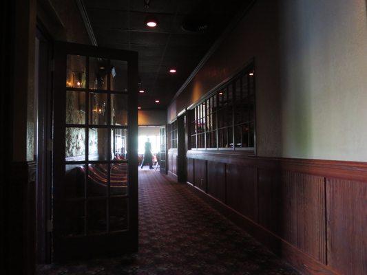 Hallway to the darker supper club dining rooms