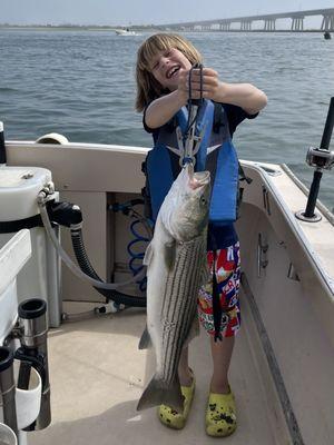 Zach with his first Striped Bass