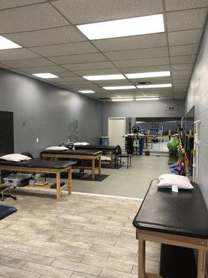 Performance Rehab at 75th offers open treatment space for physical therapy, hand therapy, Pilates, and performing arts.