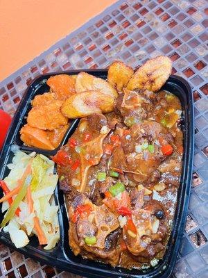 Oxtail Rice and Peas Cabbage Macaroni and Cheese Fried Plantains