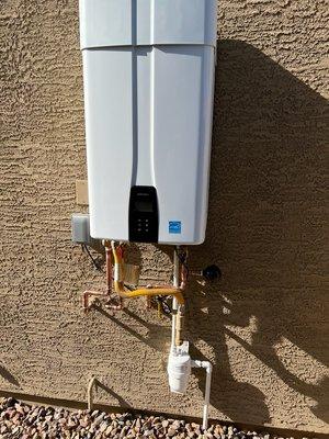 Newly installed outdoor Navien 240A2 Tankless Water Heater.