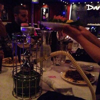 Orange mint hookah. Best flavor there. My cousin holding a plate of Tabuli salad.