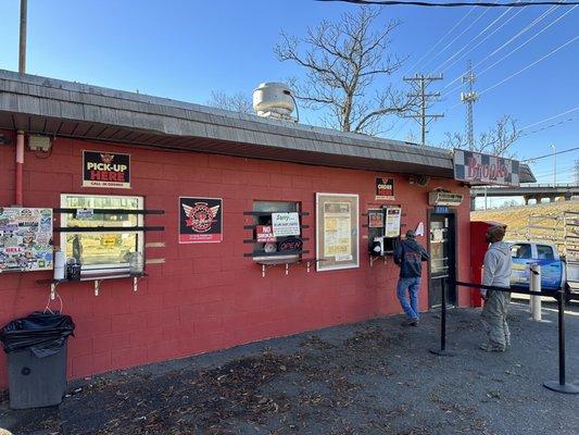 You place your order on the right side and pick it up on the left. You use to be able to go inside to order but I guess that's a wrap.