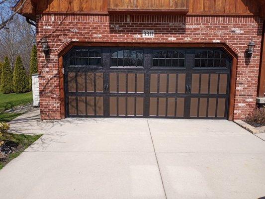 Custom two tone colored carriage style garage door.