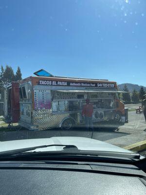 Taco truck near as fuel station and the entrance to Premier RV Resort.