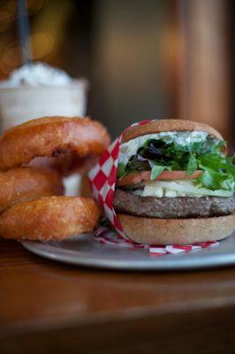 Gyro burger with onion rings and a chocolate shake