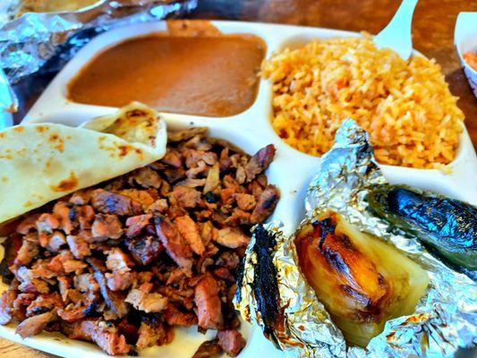 Carne Asada Combination.  Ooooh the fresh hot flour tortillas are !  They have corn too. $9.99 and bring a empty stomach.