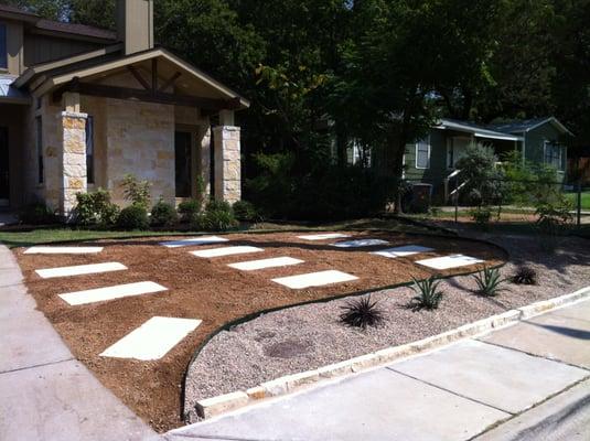 Complete Remodel.  Removed Grass, Installed Stone Border, Granite, Pea Gravel, Limestone Pavers, Mulch and Top Soil.