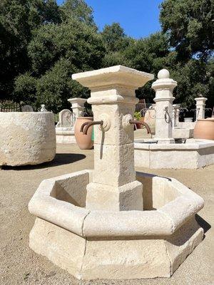 Limestone Fountains From France. Hand carved and hand patina central fountain made in Provence from limestone.