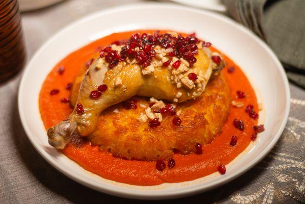 Safron chicken leg with apricot on crispy rice