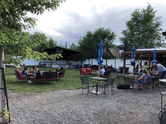 Huge amount of shared outdoor seating for Red Barn Creamery and the House