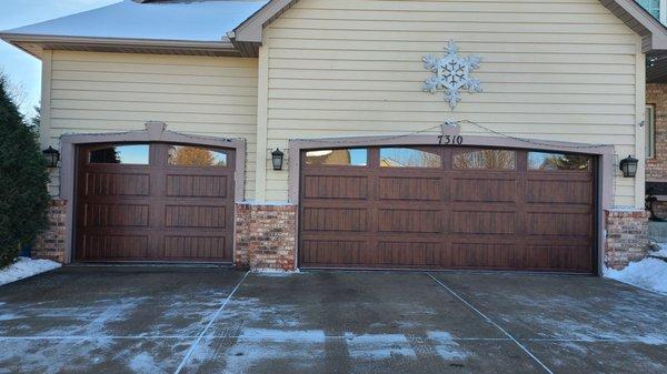 Walnut carriage style garage doors.