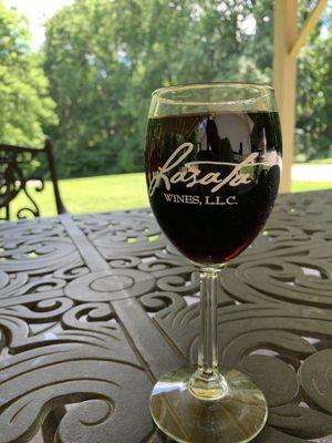 Enjoying some wine under their covered patio area