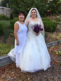 Kim of Q Cleaner & Tailor with happy bride wedding dress alteration customer (helped 'bride to be' after Alfred Angelo wedding store closed)