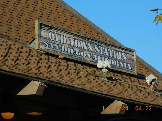 When you arrive in at the Old Town Station the one sign that stands out over the station and the store where you can get cold drinks .