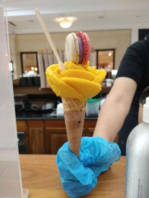 Macarose Cornetto! I got mine made with Mango sorbet with a Blueberry Cheesecake Macaron. Gorgeous presentation