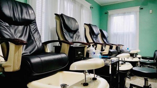 #pedicure room with 4 massage pedicure chairs.