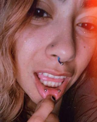 Horizontal inner lip piercing