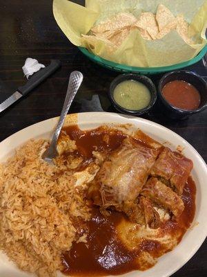 Tamales with red enchilada sauce. Delicious!