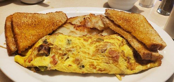 Copper Kitchen omelet, American fries and weat toast