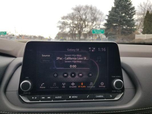 Listening to 2Pac - California Love (Remix) (feat. Dr. Dre) in the California plated 2023 Nissan Rogue from Dollar Car