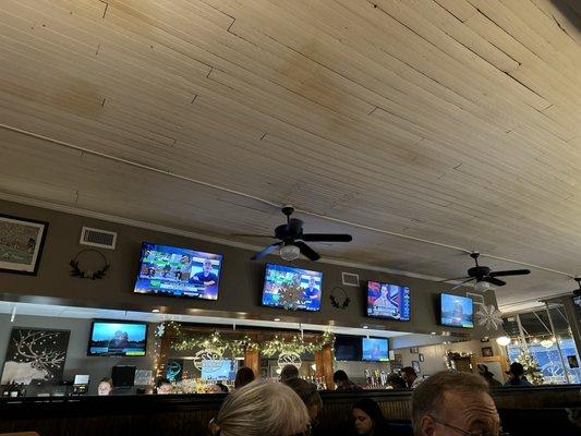 Multiple TV's and two full bars