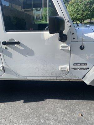 Passenger door still just as dirty as before I went through the wash , the other side looks the same