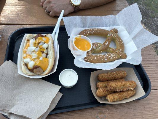 Soft pretzel, chili dog, and mozzarella sticks