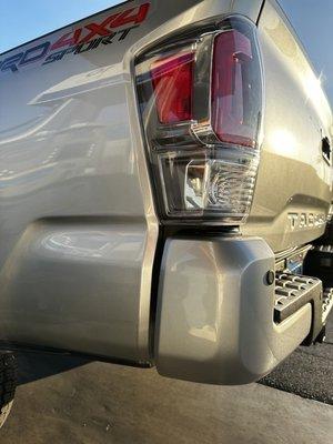 Perfectly repaired tail-light, rear bumper and rear sidewall after my truck was hit while parked.