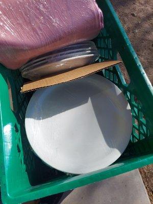 Clean dinner and salad plates nicely stacked.