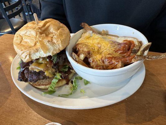 Burger with messy fries