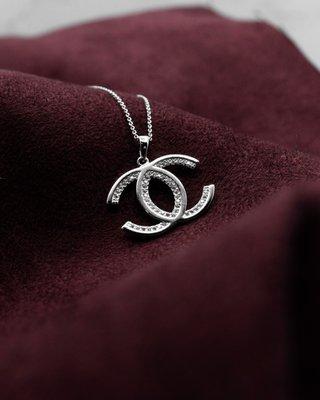 Check out this white gold diamond Chanel pendant. You can also find it in rose and yellow gold. What color matches more with your style?