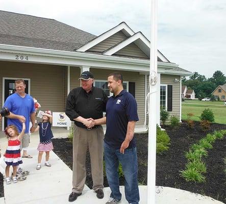 Owner, Greg Richards, with Marine Sargent Chris Santiago