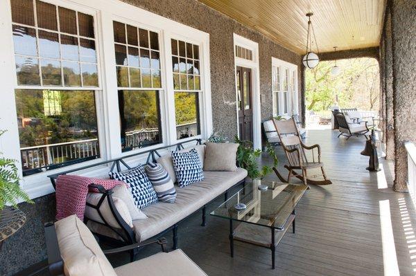 Relax and unwind on the large porch overlooking the town of Marshall and the French Broad River