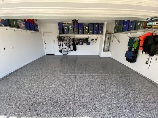 Monkey Bars shelving and garage floor epoxy all done! Now the cars will fit and can get in out of the sun.