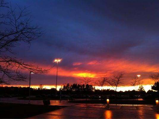 Sunset over the parking lot after a fall storm