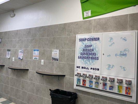 Charging station and a vending machine for laundry supplies