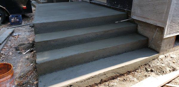 Concrete porche with steps