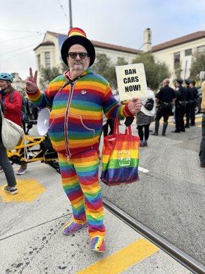 Rainbow Man says Ban Cars Now!