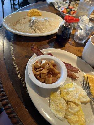 Biscuit with gravy and traditional 2 egg meal