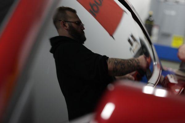 J applies ceramic coating to the Mustang