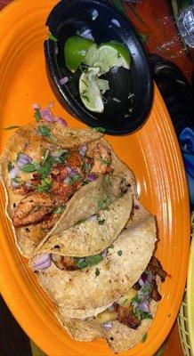 Chicken, pastor, and shrimp tacos