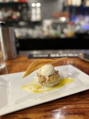 Amazing bread pudding with pineapple sauce on the bottom and plantain on the top! Delicious