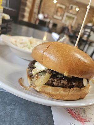 Mushrooms and Swiss burger and coleslaw