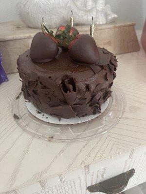 Chocolate cake with hand dipped strawberries.