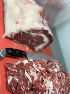 Freshly sliced, NEVER FROZEN, prime rib! Custom craft your own cheesesteak!