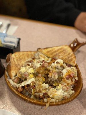 Meat lovers skillet with white toast